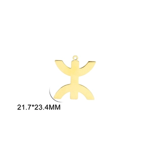 Macro shot of 18K gold plated Berber Yaz symbol pendant with size 21.7x23.4mm measurements