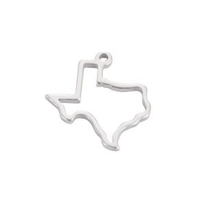 Detailed close-up of hollowed-out stainless steel Texas map pendant for DIY jewelry