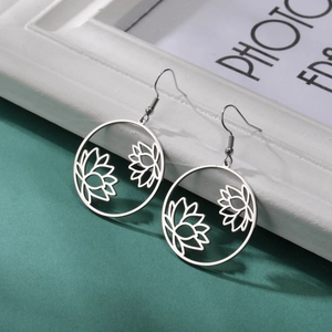 Elegant silver stainless steel lotus earrings with hollow circular flower design