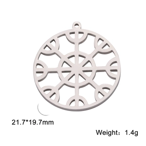 Detailed view of hollow snowflake pendant with 21.7x19.7mm size and 1.4g weight