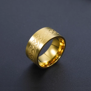 Macro view of 10mm wide gold stainless steel ring with Celtic knot braided pattern