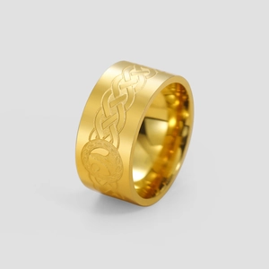 Detailed macro view of 18K gold plated stainless steel ring with Celtic knot pattern