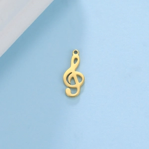 Polished gold treble clef music note pendant on light blue textured background