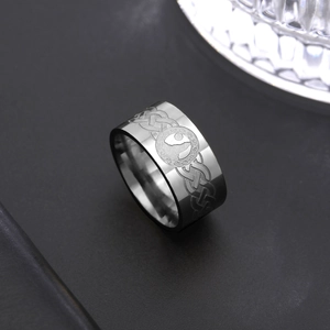 Mens 10mm stainless steel ring with wolf and moon engraving and Celtic knot patterns