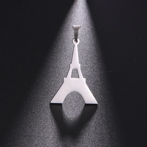 Polished silver stainless steel Eiffel Tower pendant necklace on a sleek black background