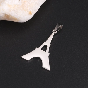 Polished stainless steel Eiffel Tower pendant necklace charm on a minimalist black background