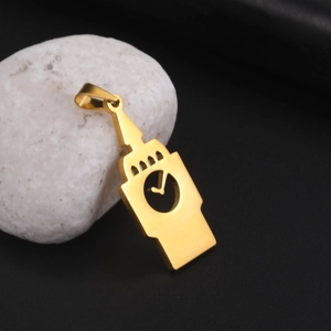 Golden stainless steel Big Ben clock tower pendant with cutout design on white stone