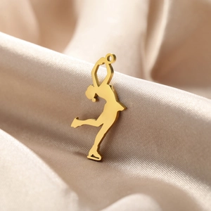 Elegant gold stainless steel figure skater silhouette pendant on champagne silk fabric