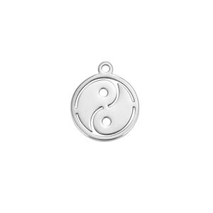 Detailed macro view of silver stainless steel Tai Chi pendant with hollow engraving design