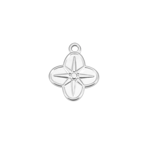 Macro shot of silver stainless steel four-leaf clover pendant with star sunburst engraving