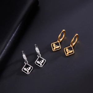 Gold and silver minimalist square hollow bird pendants on stainless steel hoop earrings