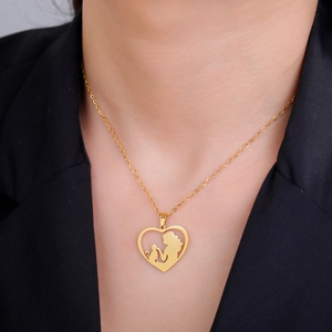 Golden heart necklace with cat and woman silhouette pendant on elegant link chain