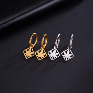 Luxe stainless steel hoop earrings with maple leaf charms in gold and silver finish