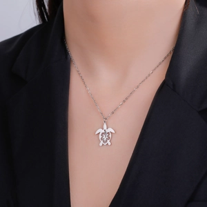 Silver hollow turtle pendant necklace with floral pattern on O-chain for women