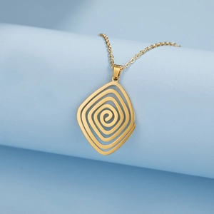 Golden spiral swirl diamond-shaped pendant necklace on a minimalist blue display
