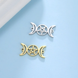 Triple Moon and Pentagram pendants in gold and silver finish on light blue surface