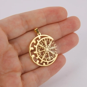 Gold stainless steel Viking Vegvisir compass pendant being held for size demonstration