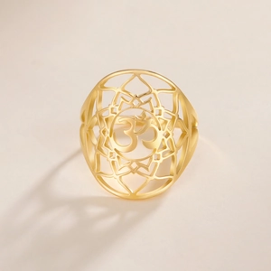 Elegant 18K gold-plated titanium steel ring featuring an openwork Om symbol mandala design