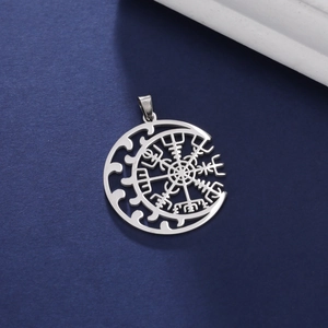 Detailed view of silver Viking Vegvísir compass and crescent moon pendant jewelry