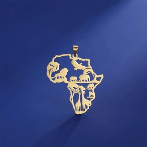 Macro detail of 18K gold Africa map pendant with hollow animal silhouette carvings