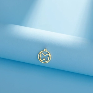 Golden round hollow butterfly pendant in polished stainless steel for DIY jewelry