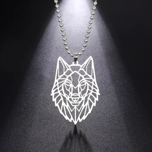 Detailed close-up of geometric hollow wolf head pendant in silver stainless steel finish
