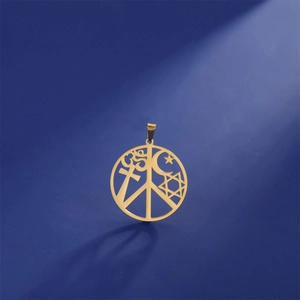 Macro detail of 18K gold plated steel pendant with multi-faith religious symbols