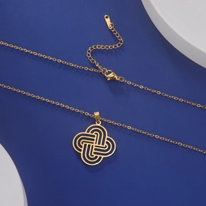 Detail of gold stainless steel necklace showing lobster clasp and S.STEEL engraving