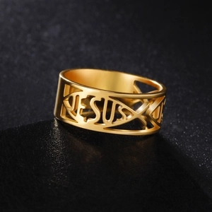 Close-up of golden stainless steel Jesus fish ring with hollow Ichthys design
