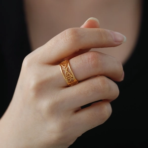 Golden titanium steel Jesus fish hollow ring worn on finger for a minimalist look