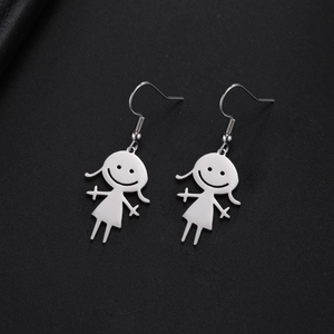 Funny stainless steel earrings featuring cute cartoon girl pendants with smiling faces
