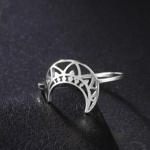 Macro shot of 18K gold plated titanium steel ring with hollow moon design details