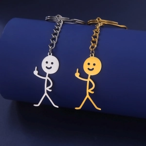 Funny stainless steel stickman keychain in gold and silver with middle finger gesture