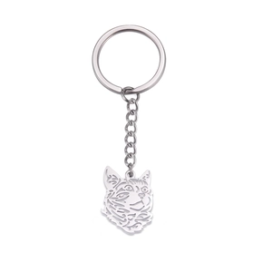 Minimalist silver metal keychain with cutout cat head pendant and tribal pattern design