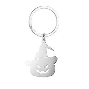 Detail of silver pumpkin keychain with wizard hat and hollow Jack-O-Lantern face