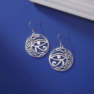 Silver stainless steel Eye of Horus earrings with Celtic knot on a deep blue background
