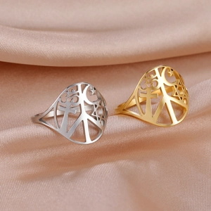 Adjustable stainless steel rings with gold and silver cutout celestial and peace symbols