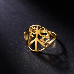 Golden stainless steel celestial ring with peace and religious symbols over black background