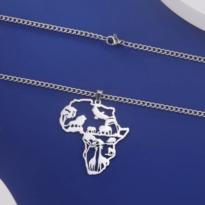 Detailed silver African map pendant with intricate hollow animal silhouettes and thin chain