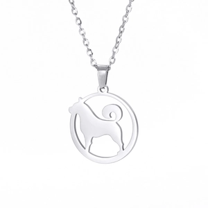 Minimalist silver dog pendant necklace with a standing puppy silhouette in a round frame