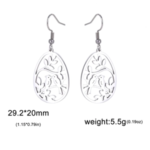 Boucles d'oreilles pendantes en acier argenté ajouré avec motif oiseau et branche