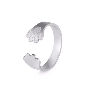 Minimalist silver dog paw open ring in polished stainless steel with adjustable band