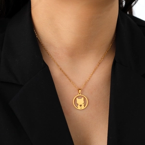 Elegant gold necklace featuring a hollow cat and heart pendant on a delicate link chain
