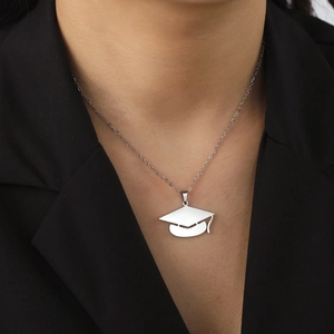 Polished stainless steel graduation cap pendant necklace with tassel on a fine chain