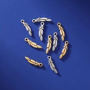 Polished feather-shaped stainless steel pendants in gold and silver for DIY jewelry making
