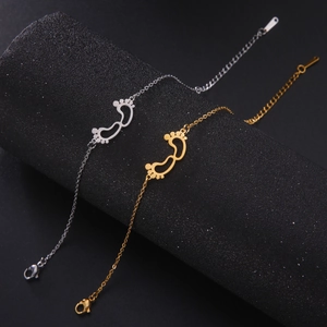 Chic stainless steel hollow baby footprint bracelets in gold and silver finishes