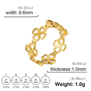 Golden stainless steel clover ring with hollow pattern and product dimensions overview