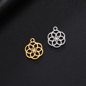 Colgante geométrico giratorio flor mandala vintage en acero inoxidable oro y plata