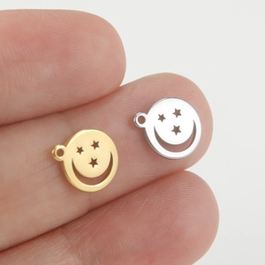 Pendentifs smiley évidés en acier inoxydable doré et argenté sur le bout des doigts