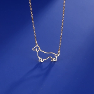 Minimalist gold dachshund puppy pendant necklace crafted from polished stainless steel